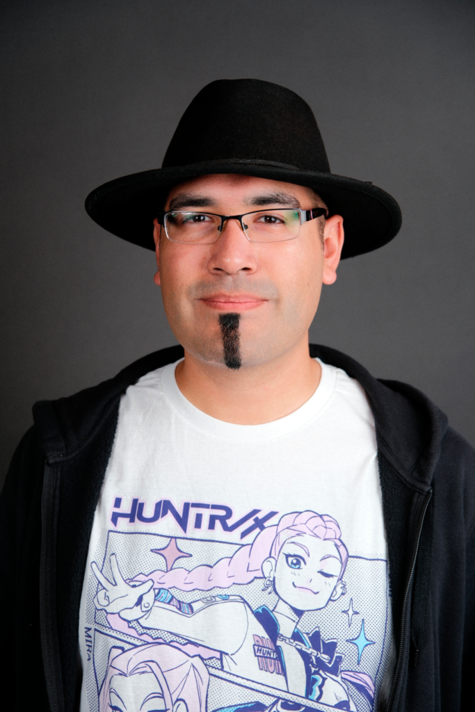 mat with a hat that is a filmmaker